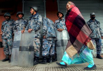 woman in a blanket  & kids in cheap armour