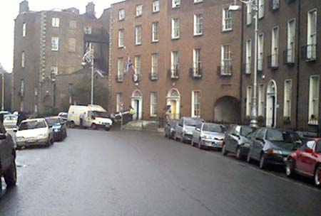 The Garda pick the coffin up off the doorstep