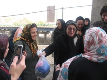 Khadijeh greeted by friends on her release.