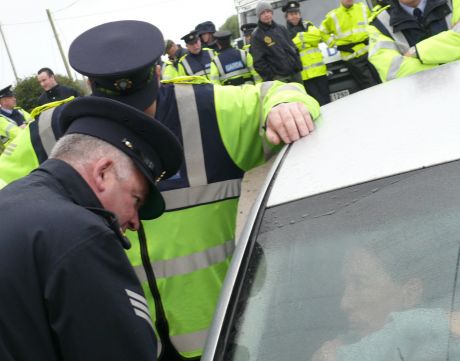 Maura Harrington in her car being 'advised' by Gardai