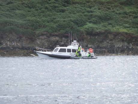 Garda hanging out on the Shell boats