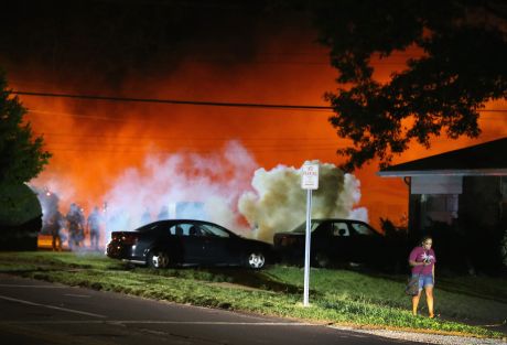 Wreathed in smoke and tear gas like a military "warzone". But this is just the US town of Ferguson