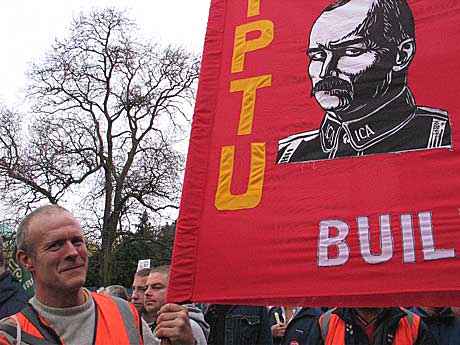 Building worker and banner