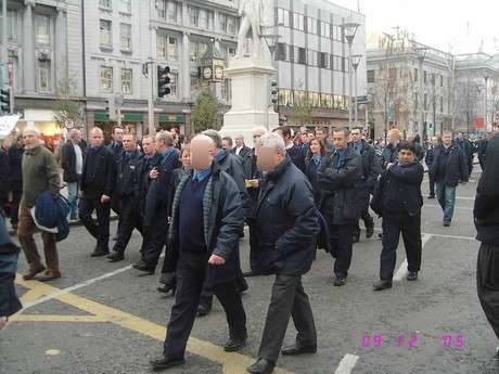 Some offical looking people?