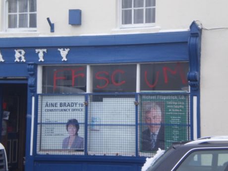 Aine Brads constituency office in Cellbridge sprayed with FF SCUM on front window.