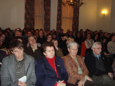 A section of the audience, with Dr. Meyer's partner Chris in front, second from the right 