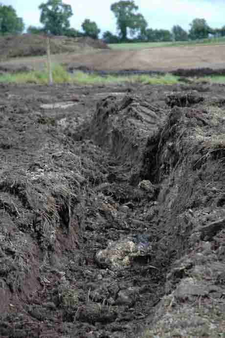 Turned Earth at sign of Tara Interchange