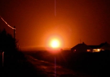 Courtesy MayoNews -LIKE THE SUN A still image taken from a recording shows the glow from the flaring at the Corrib Gas terminal on New Year’s Eve.