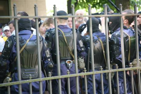 Riot police facing down the homophobes