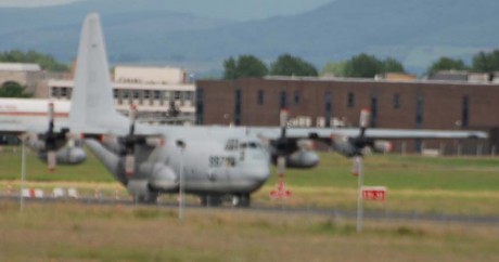 US hercules C130 warplane with Irish army escort, Shannon 27June09