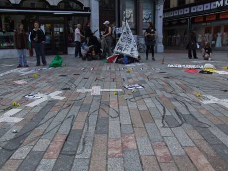 Nineteen body outlines on the city footpath - 3