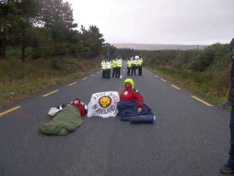 Concrete lock-on blocking Shell's haulage route