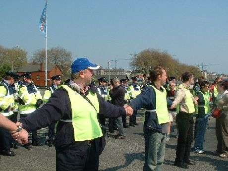march stewards and gardai at the bridge