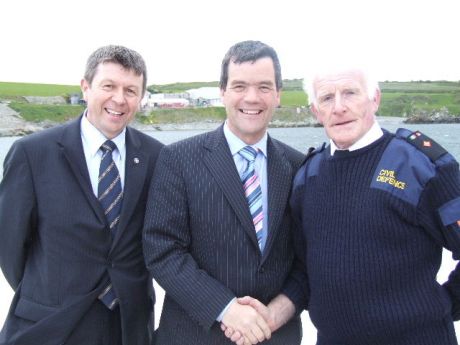 Paddy Donnelly senior executive officer in the infrastructure section of Louth county council pictured with the minister.  Paddy was MC for the opening.  On the right is James Neary, Dromiskin, a commander with the civil defence.