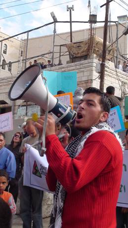 Blocking the gate to the "settlers" fortified enclave in Hebron