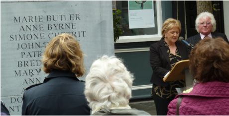 Bernie McNally, an injured survivor, reads out the names of the victims