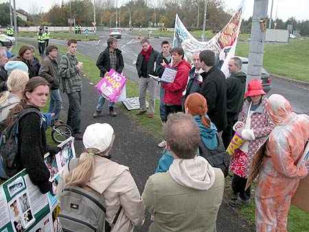 23 gather in Lidl carpark and prepare to march to Shannon Warport