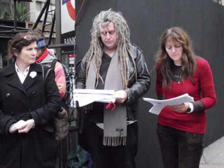 Sue and Ciaron reading the names of the military and civilian dead