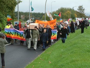 Marchers move off from Shannon Town towards airport