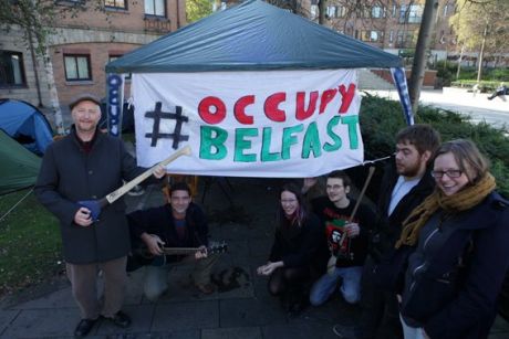Billy Bragg with Occupy Belfast (with hurl in hand...)