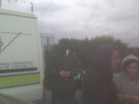 unidentified police wearing the green overalls